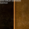 Close-up of authentic 2015 Harley-Davidson Gold Dust paint texture