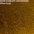 Close-up of an Olive Gold paint color swatch with '2016 HARLEY-DAVIDSON Olive Gold' text.