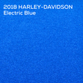 A textured blue metallic paint swatch with white text in the top-left corner reading '2018 HARLEY-DAVIDSON Electric Blue'.