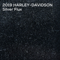 A dark textured color swatch labeled '2019 HARLEY-DAVIDSON Silver Flux' in white text at the top, showing a very dark charcoal/black metallic speckled finish.