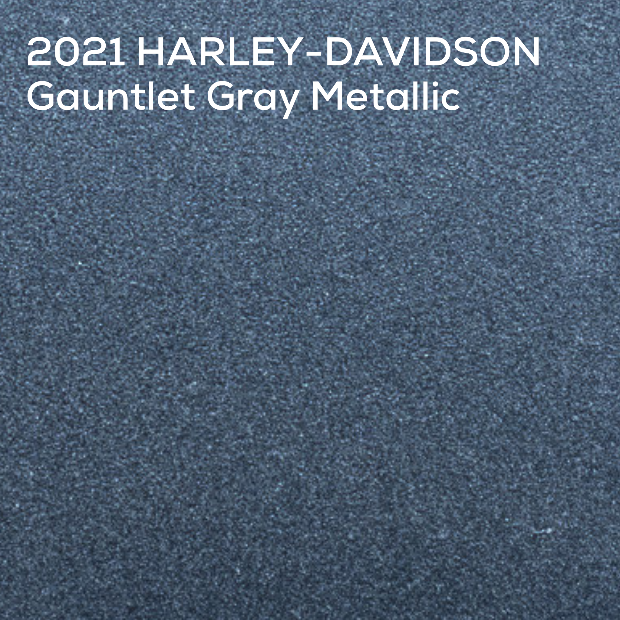 A close-up textured color swatch labeled '2021 HARLEY-DAVIDSON Gauntlet Gray Metallic' in white text at the top, showing a dark blue-gray metallic fabric or material surface.