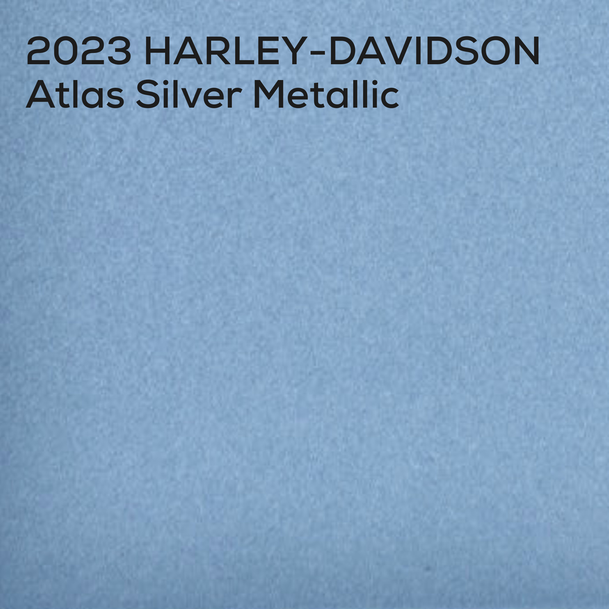 A textured light silver square with black text at the top reading '2023 HARLEY-DAVIDSON Atlas Silver Metallic'.