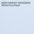 Text reading '2024 HARLEY-DAVIDSON White Onyx Pearl' on a plain light blue background.